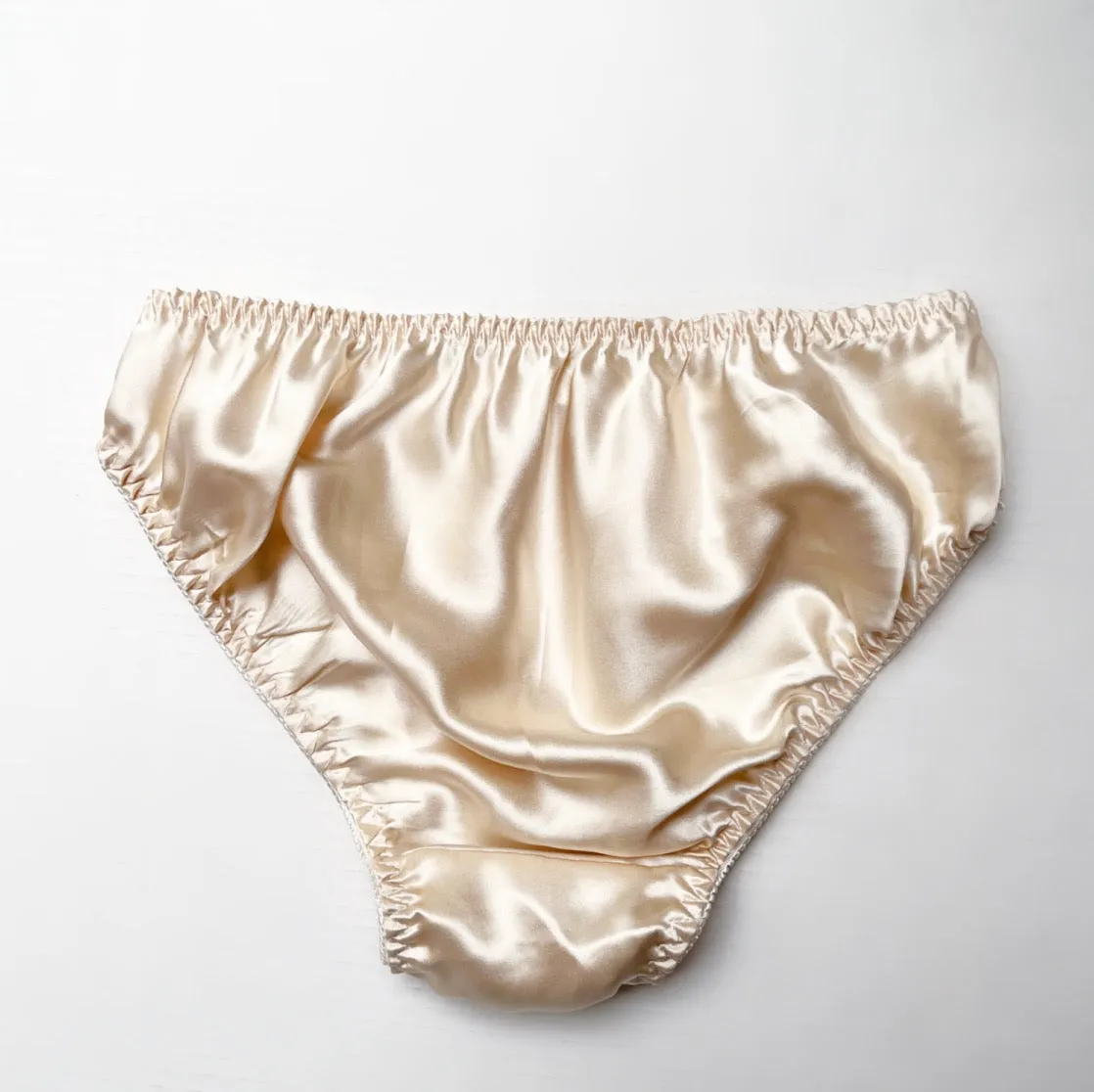 Silk bikini brief with scalloped lace